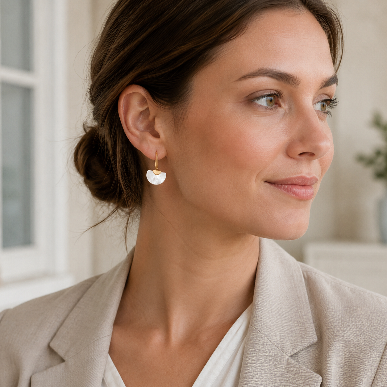 Vintage Gold mother-of-pearl fan drop earrings worn on model