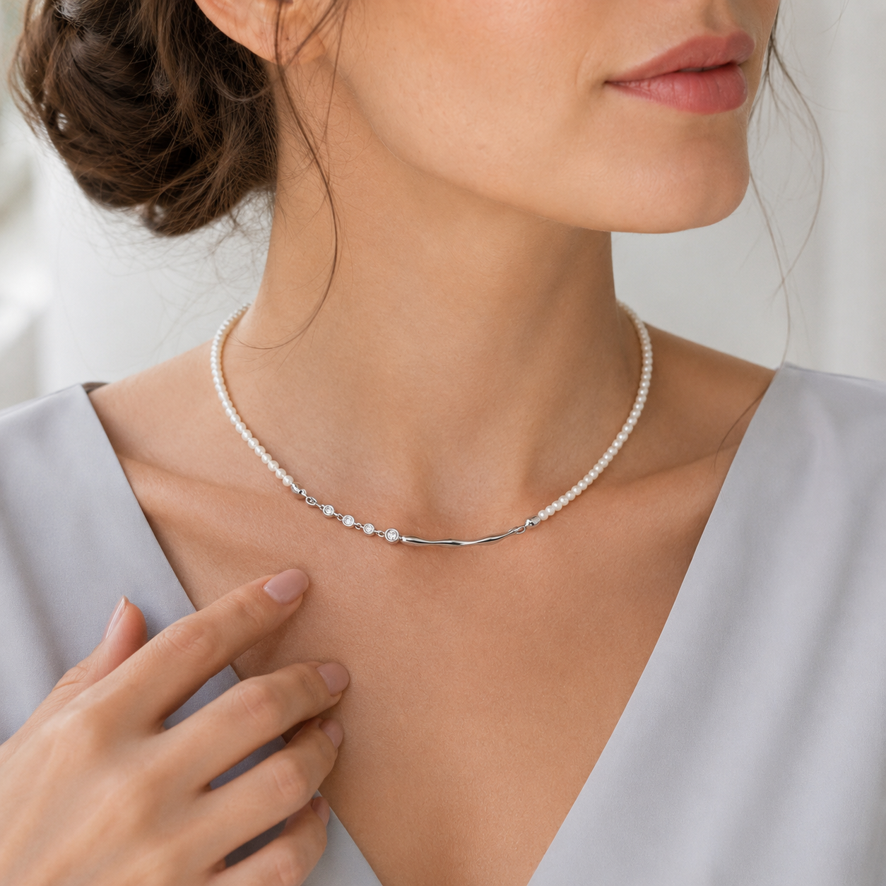 Close view of model wearing Silver fluid zircon natural pearl necklace