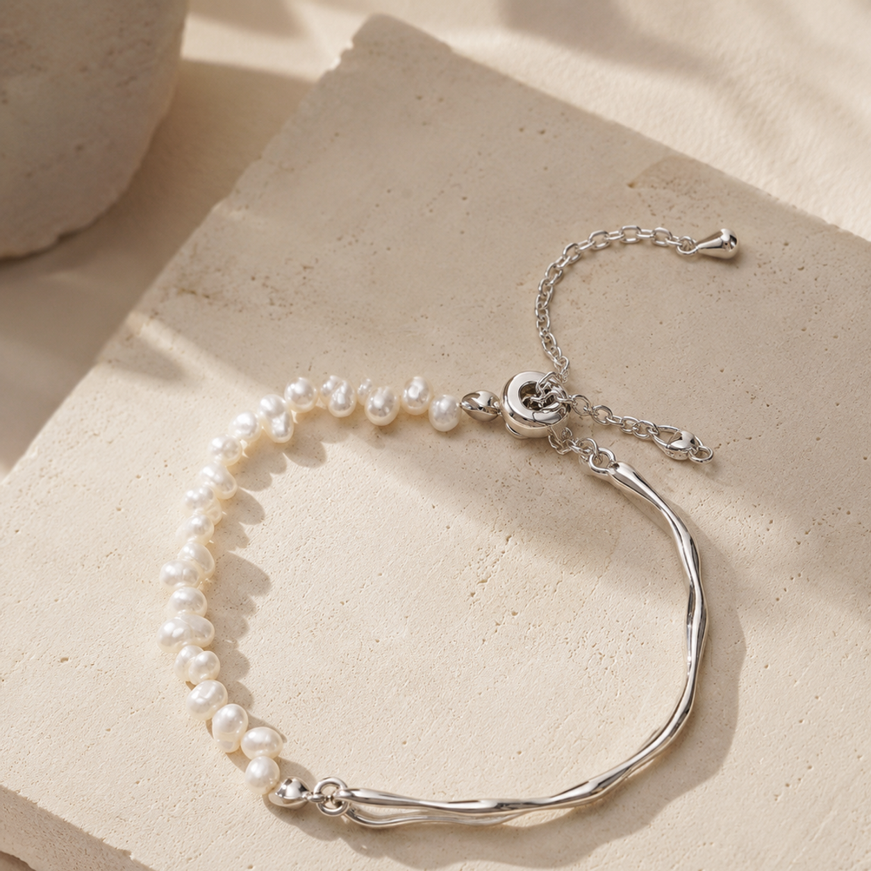 Silver natural pearl bracelet in warm daylight