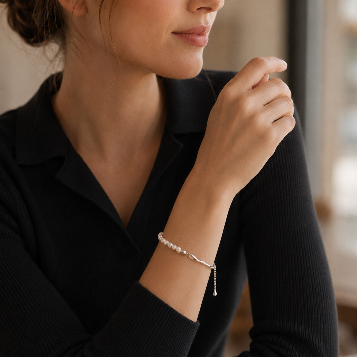 Close-up of Silver natural pearl bracelet on wrist