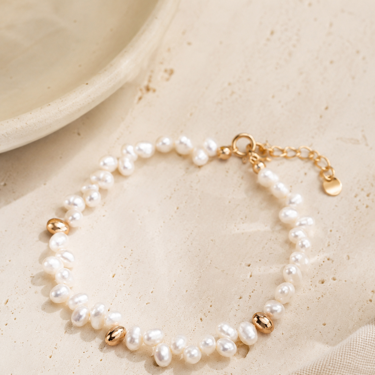 Natural pearl bracelet with polished Vintage Gold accents