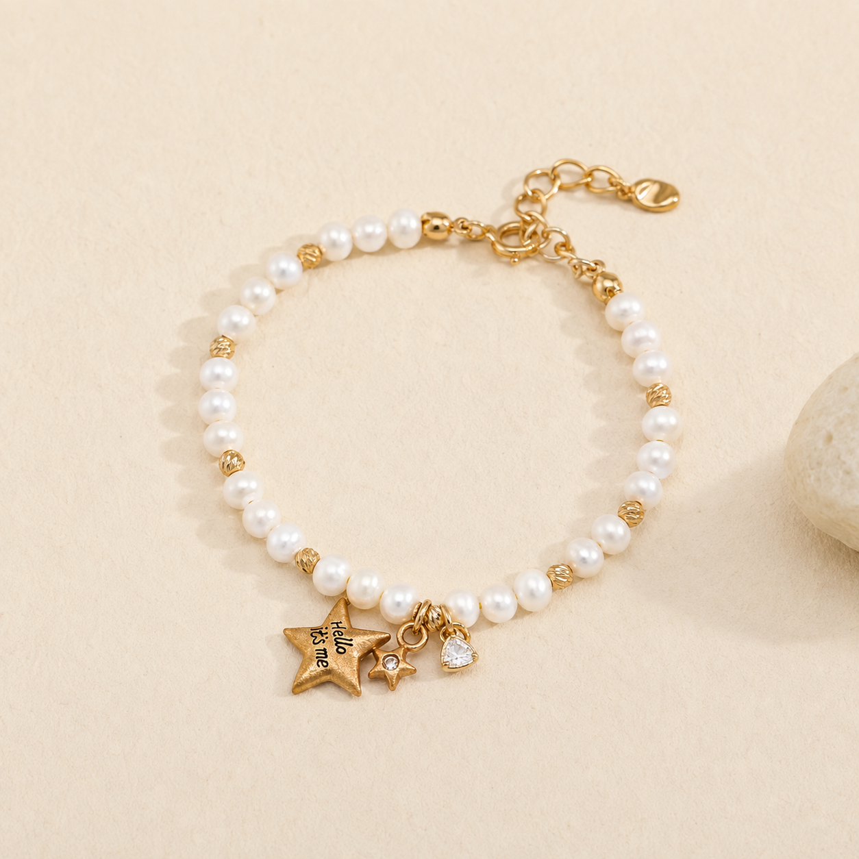 Full view of the Vintage Gold natural pearl star charm bracelet