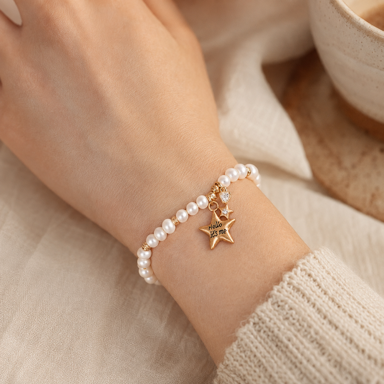 Close-up of the Vintage Gold natural pearl bracelet with star charms