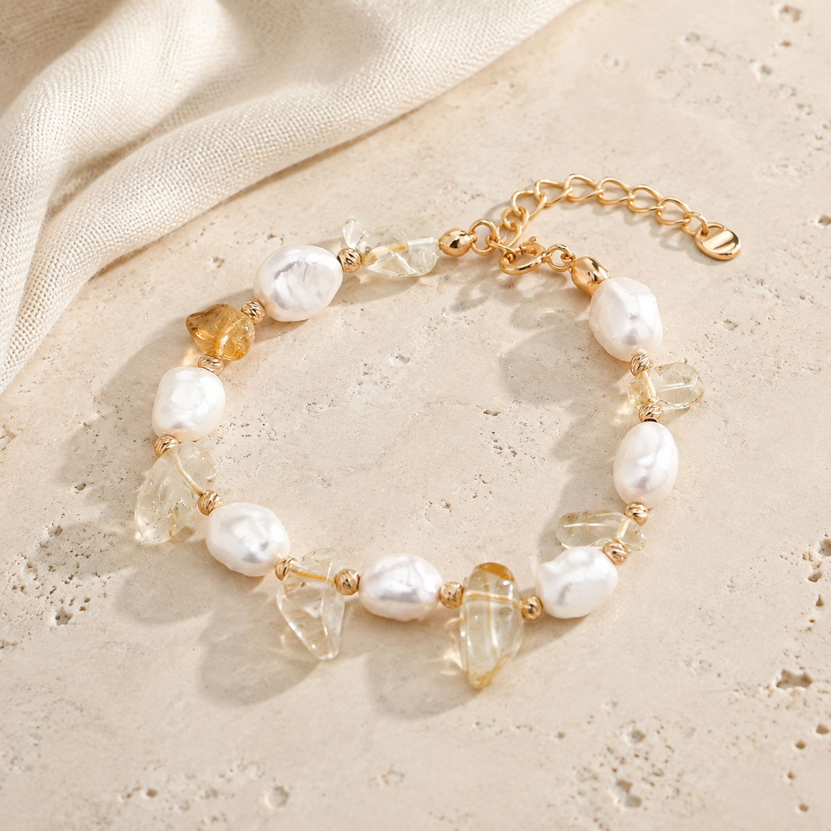 Full Vintage Gold Fortune Pearl Crystal Bracelet on an ivory stone surface