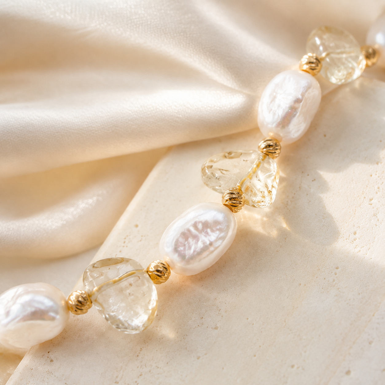 Close product view of natural pearls and clear crystal beads on the Vintage Gold bracelet