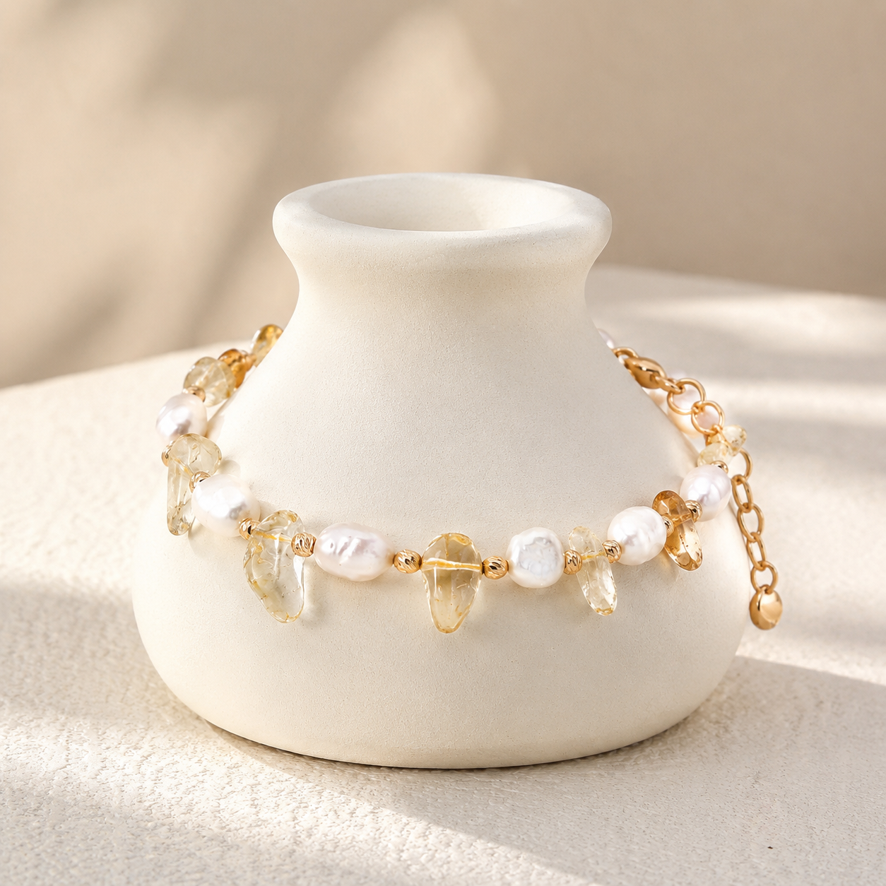 Vintage Gold Fortune Pearl Crystal Bracelet displayed on an ivory vessel