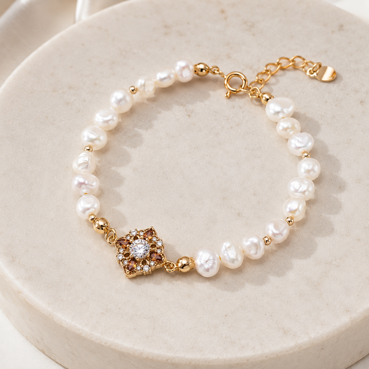 Full Vintage Gold floral natural pearl bracelet on a round ivory display
