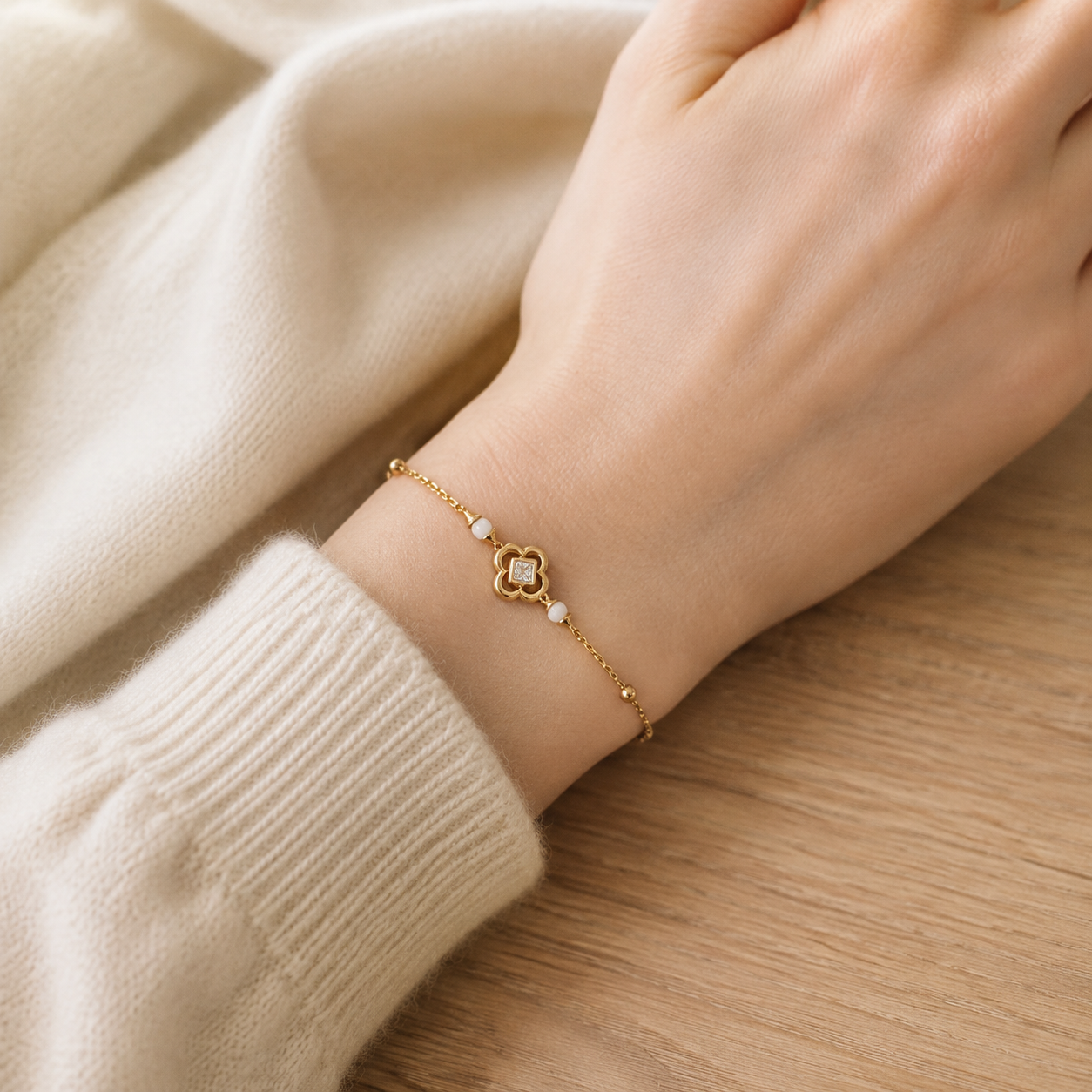 Model wearing Vintage Gold clover shell and zircon bracelet