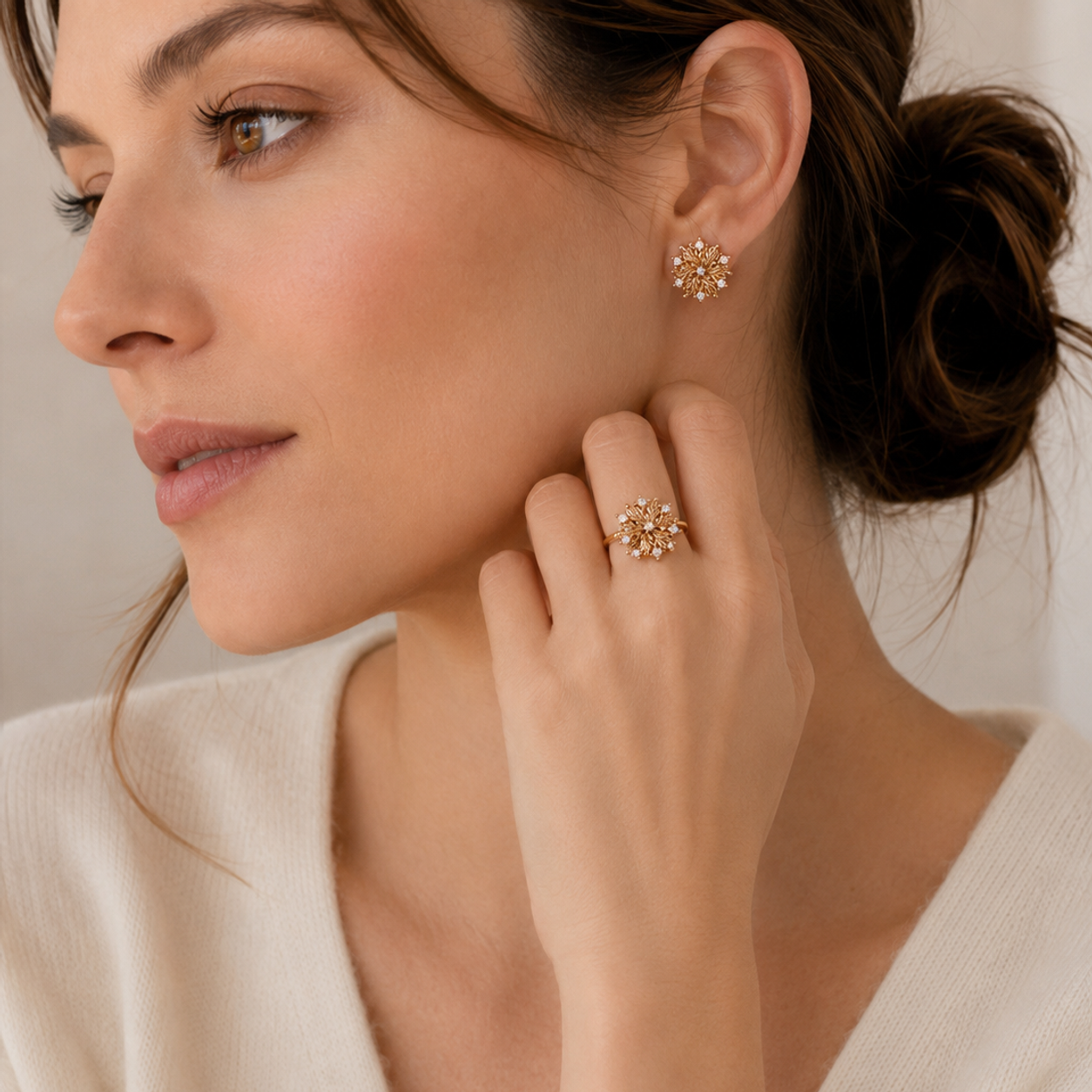 Model styling the Vintage Gold Six-Petal Lily jewelry collection