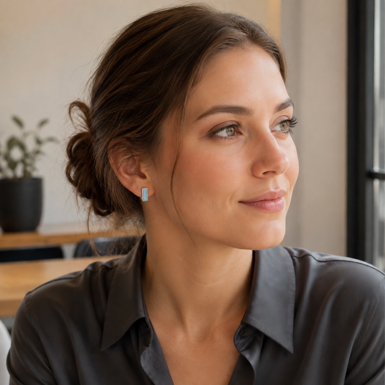 Model wearing Silver French enamel drop stud earrings