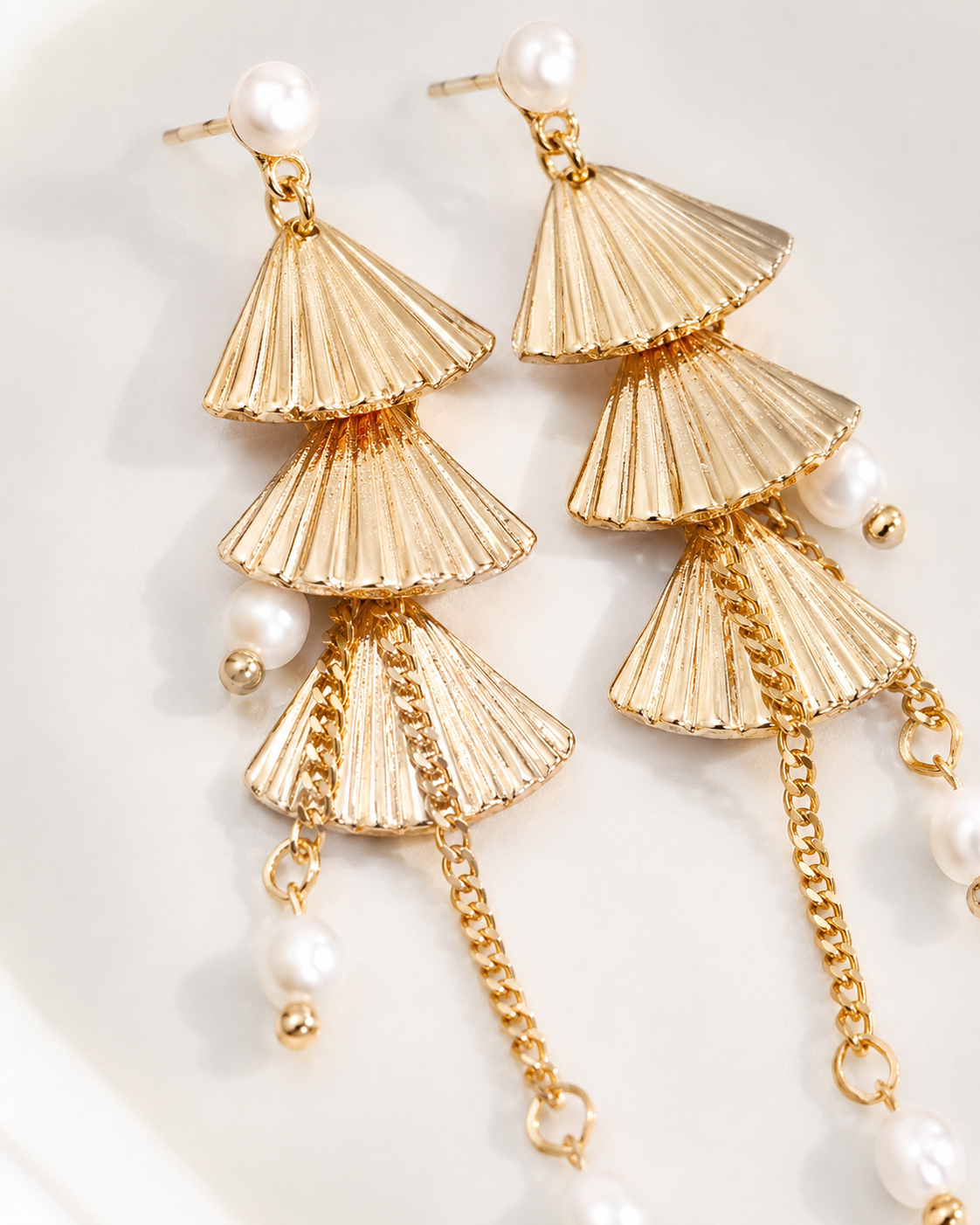 Vintage gold layered fan natural pearl earrings close-up