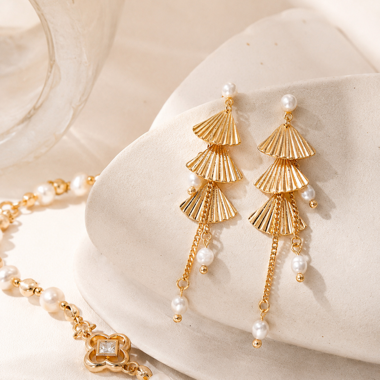 Vintage Gold pearl fan earrings styled with coordinating bracelet
