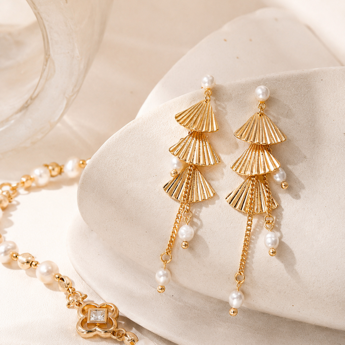 Vintage Gold pearl fan earrings styled with coordinating bracelet