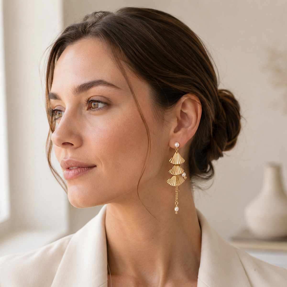 Model wearing Vintage Gold layered fan pearl earrings