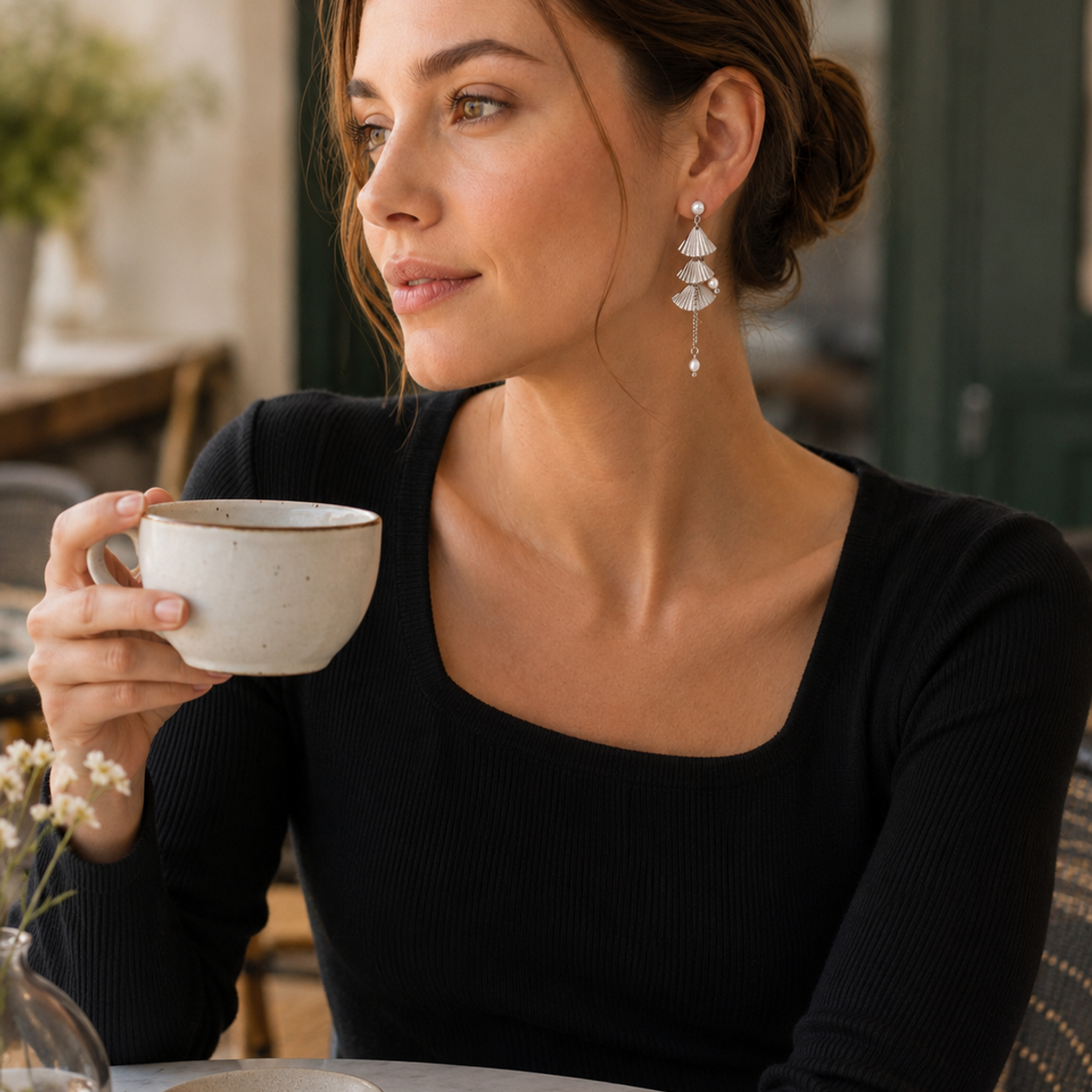 Model wearing Silver layered fan pearl earrings