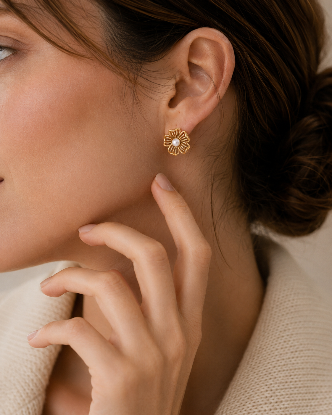 Close-up of Vintage Gold floral pearl stud earring