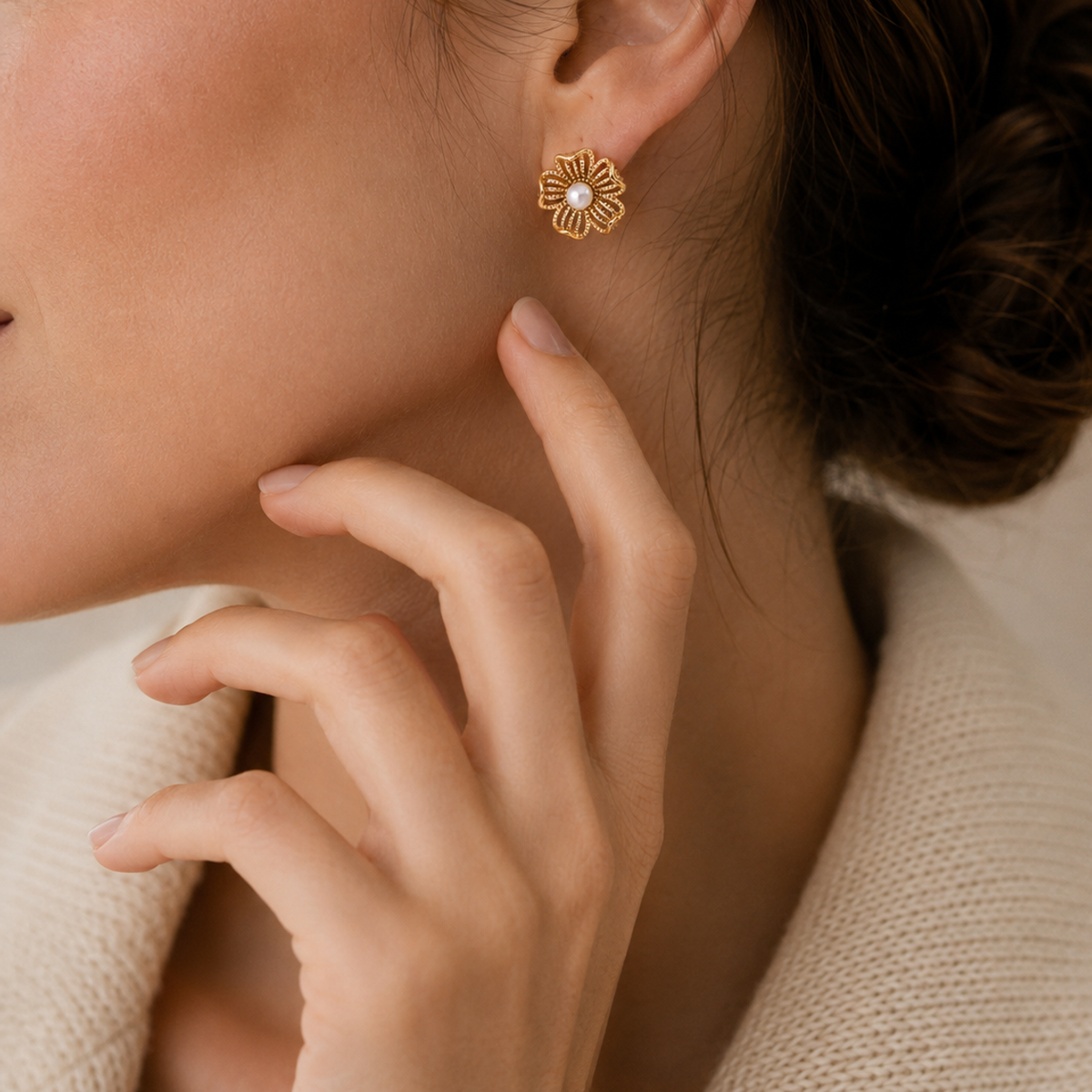 Close-up of Vintage Gold floral pearl stud earring