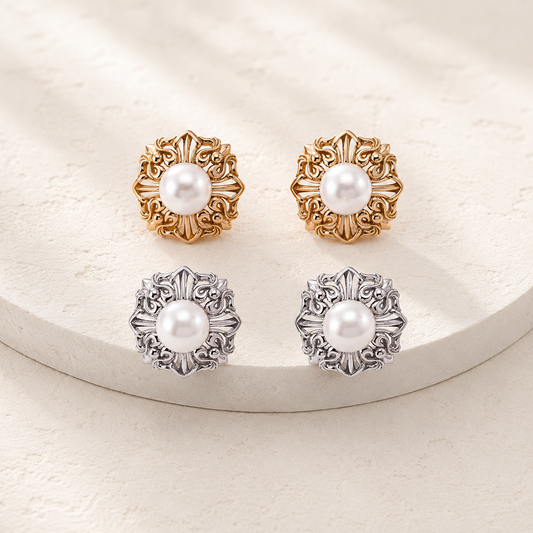 Vintage Gold and Silver Ornate Pearl Stud Earrings shown together on an ivory display