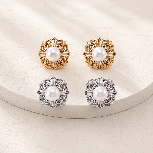 Vintage Gold and Silver Ornate Pearl Stud Earrings shown together on an ivory display