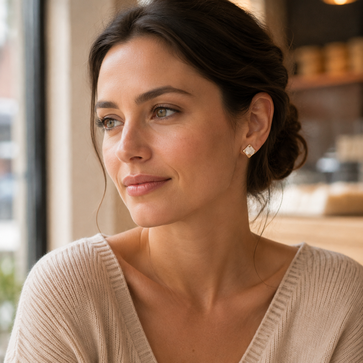 Model wearing Vintage Gold shell mosaic stud earrings
