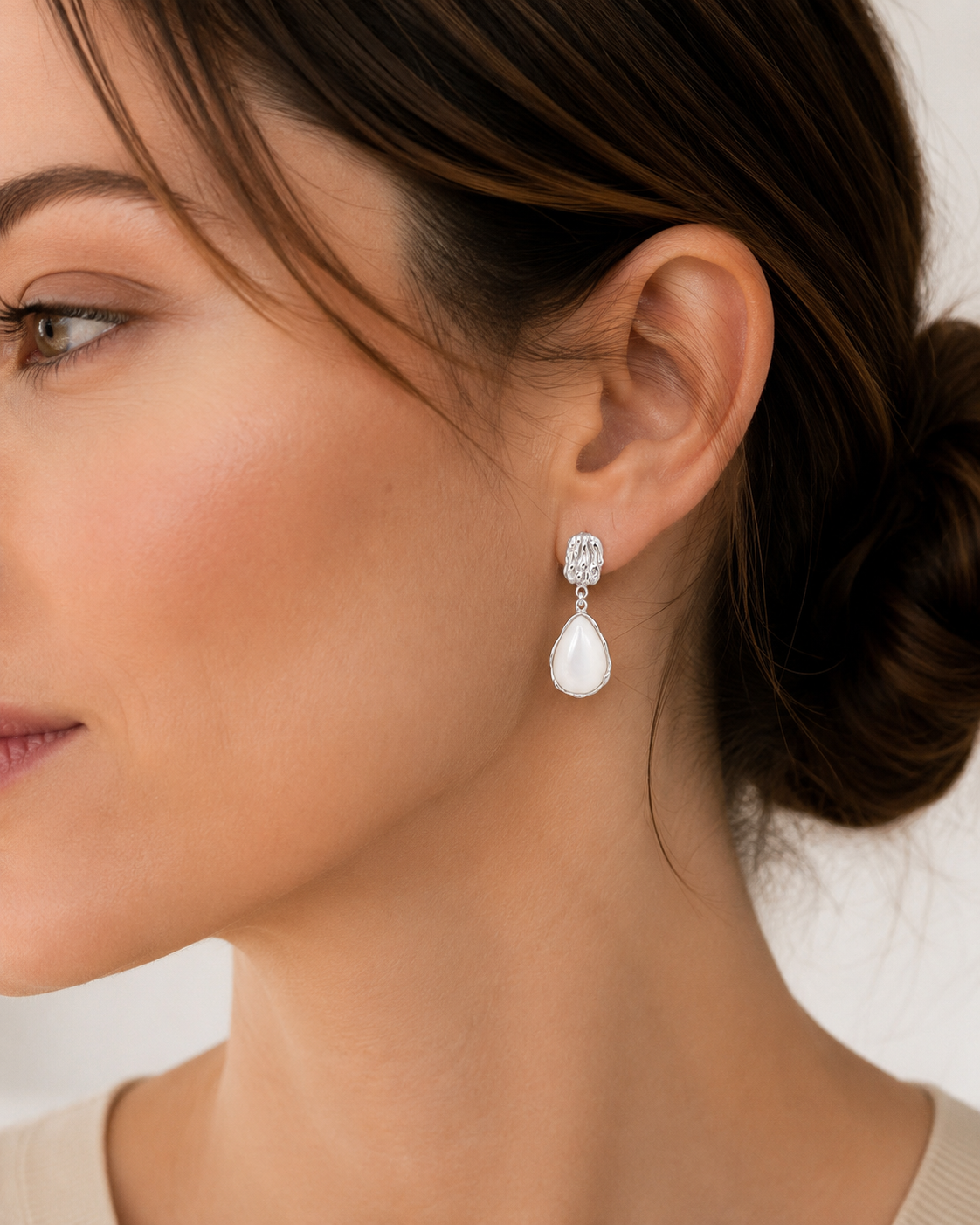 Mother of Pearl drop earrings styled in Silver