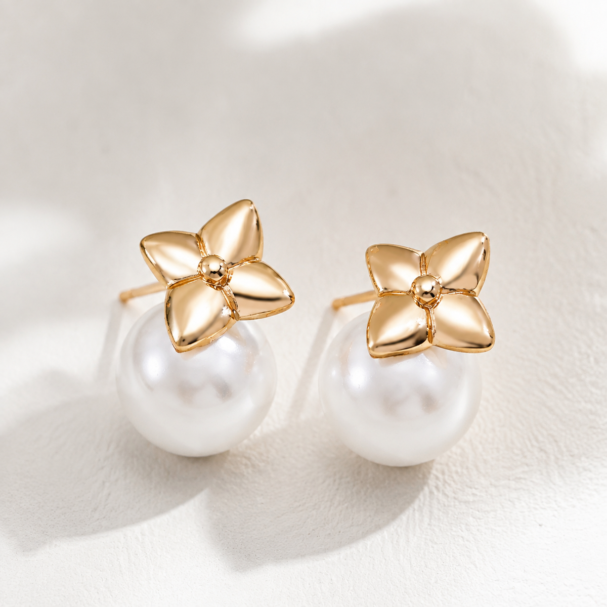 Close product view of Vintage Gold four-leaf shell pearl stud earrings