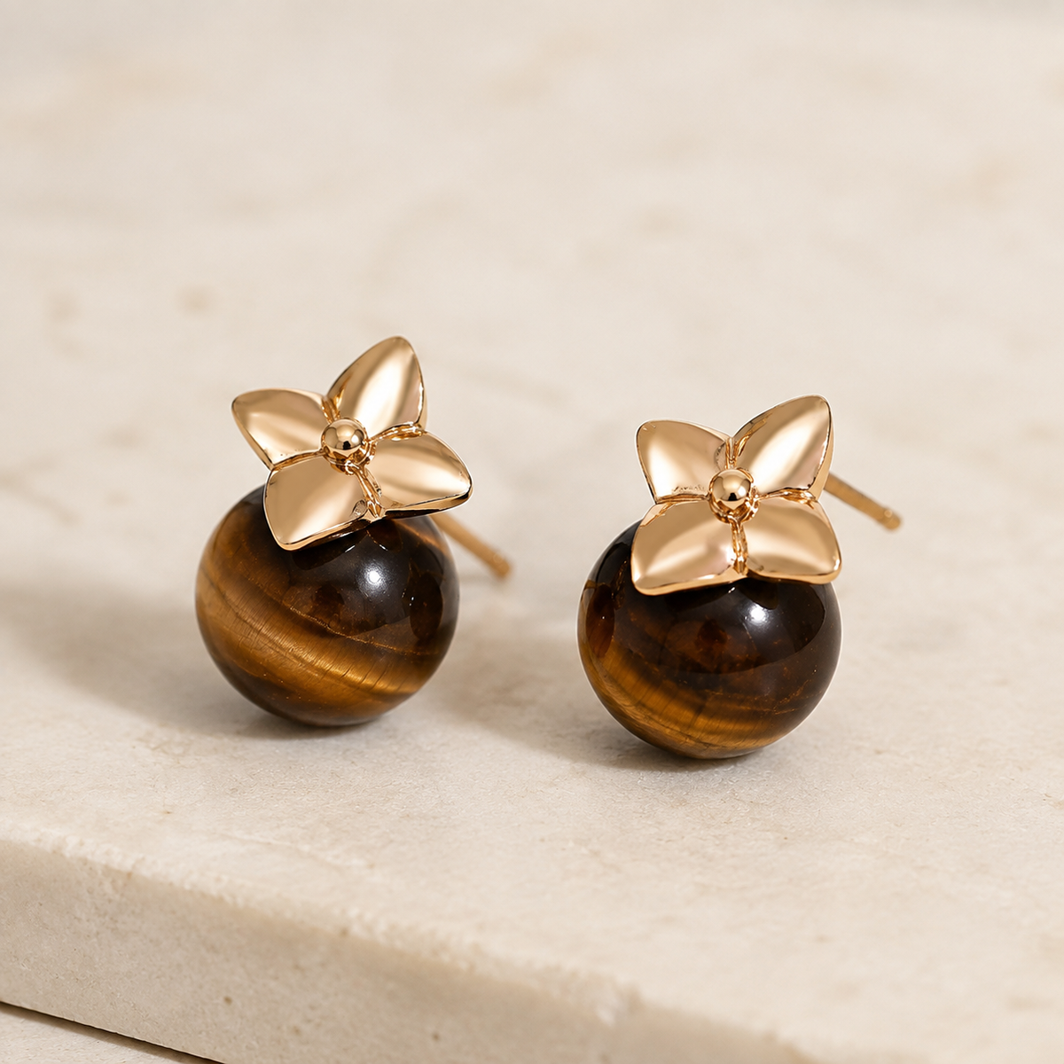 Close product view of Vintage Gold four-leaf tiger eye stud earrings