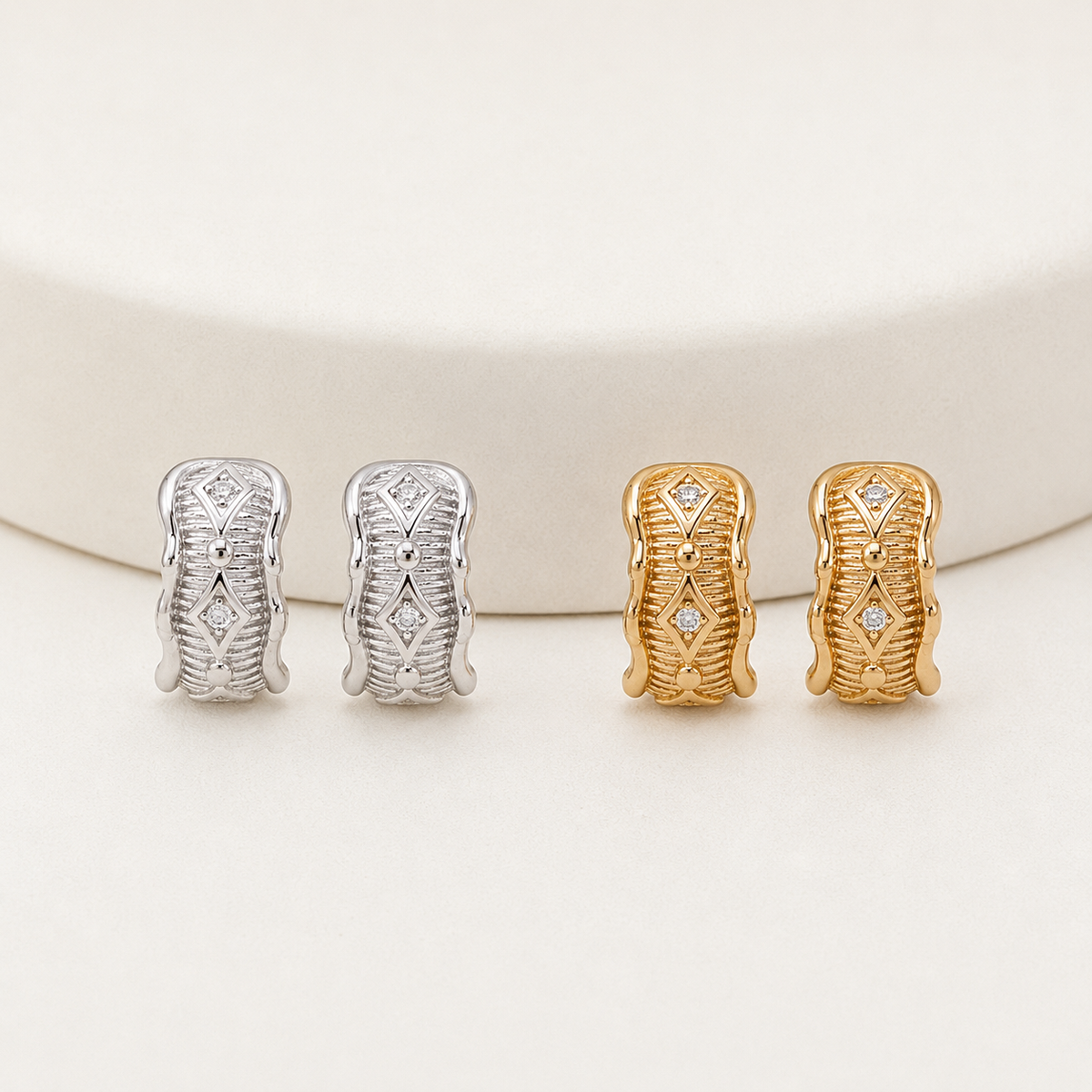 Vintage Gold and Silver Vintage Zircon Stud Earrings shown together