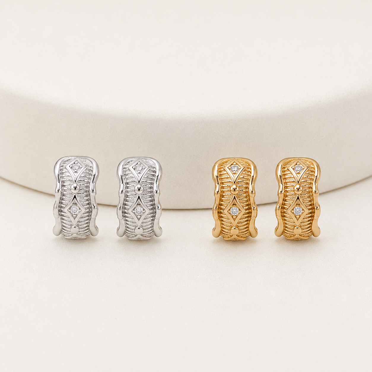 Vintage Gold and Silver Vintage Zircon Stud Earrings shown together