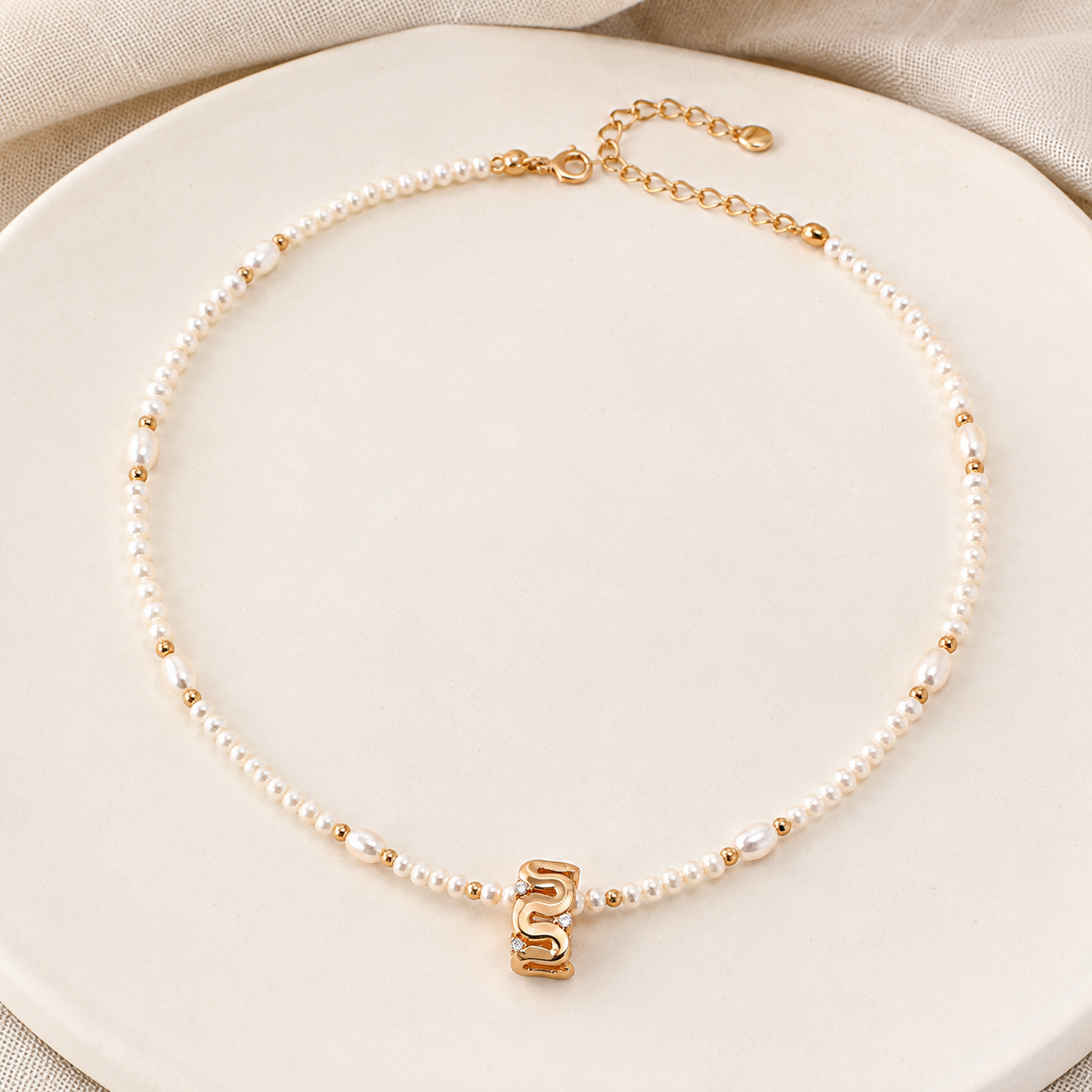 Vintage Gold sculpted natural pearl zircon necklace flat lay
