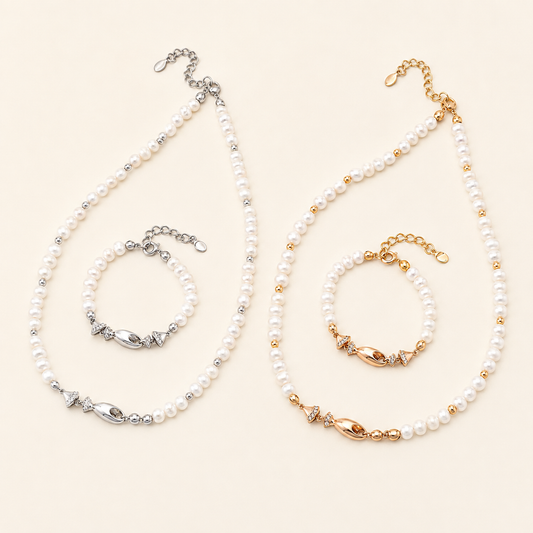 Vintage Gold and Silver natural pearl fish necklace and bracelet sets shown together