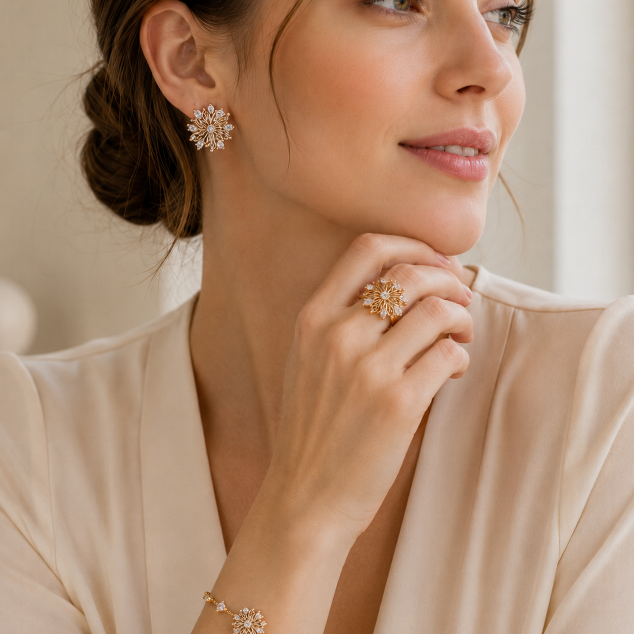 Model wearing the Vintage Gold Six-Petal Lily ring, bracelet, and stud earrings