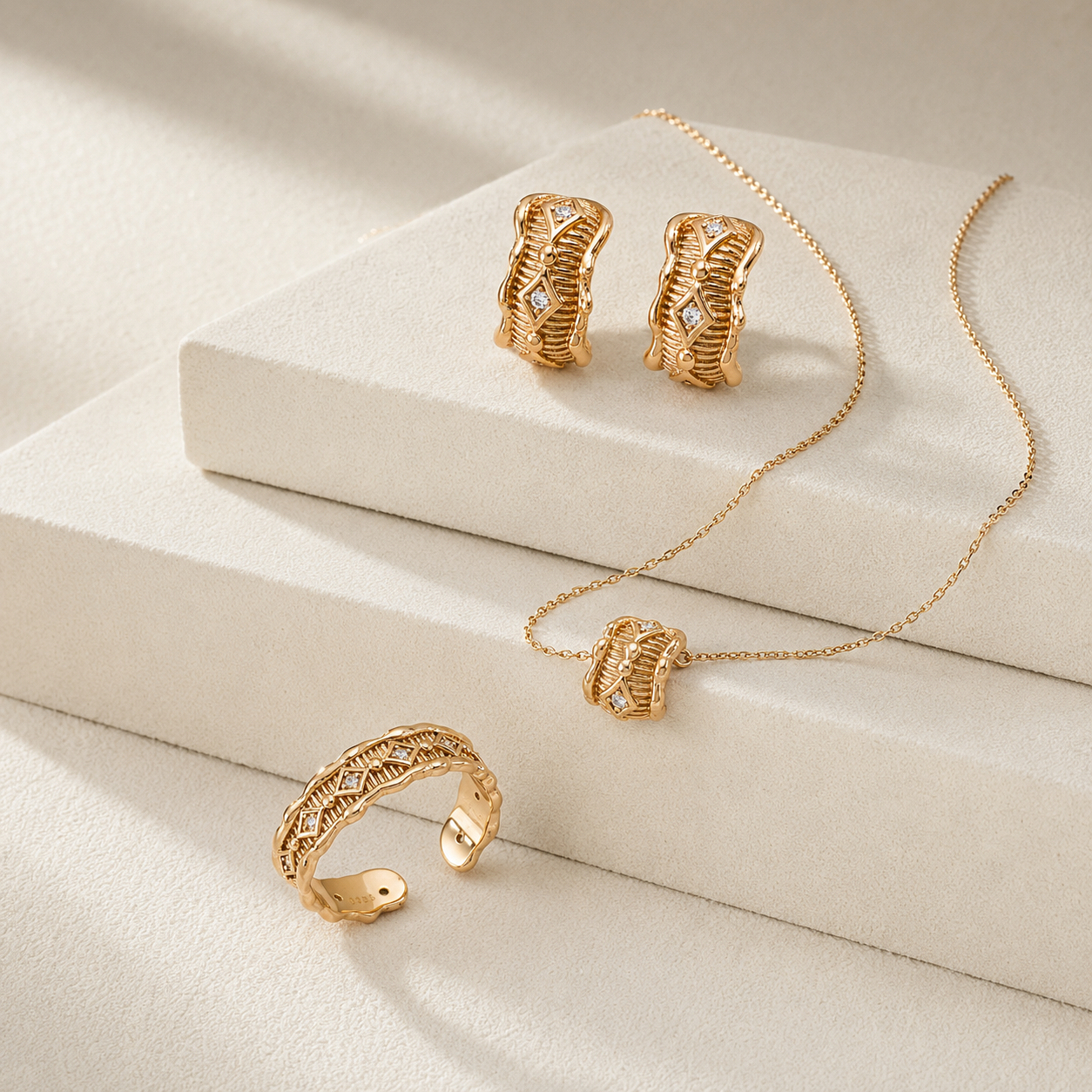 Vintage Gold zircon jewelry set with ring, pendant necklace, and stud earrings on white displays