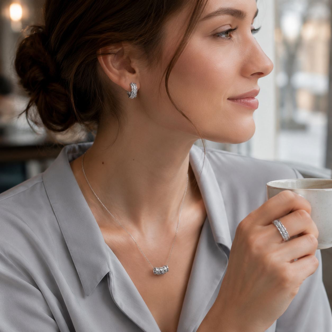 Close view of model wearing the Silver zircon jewelry set