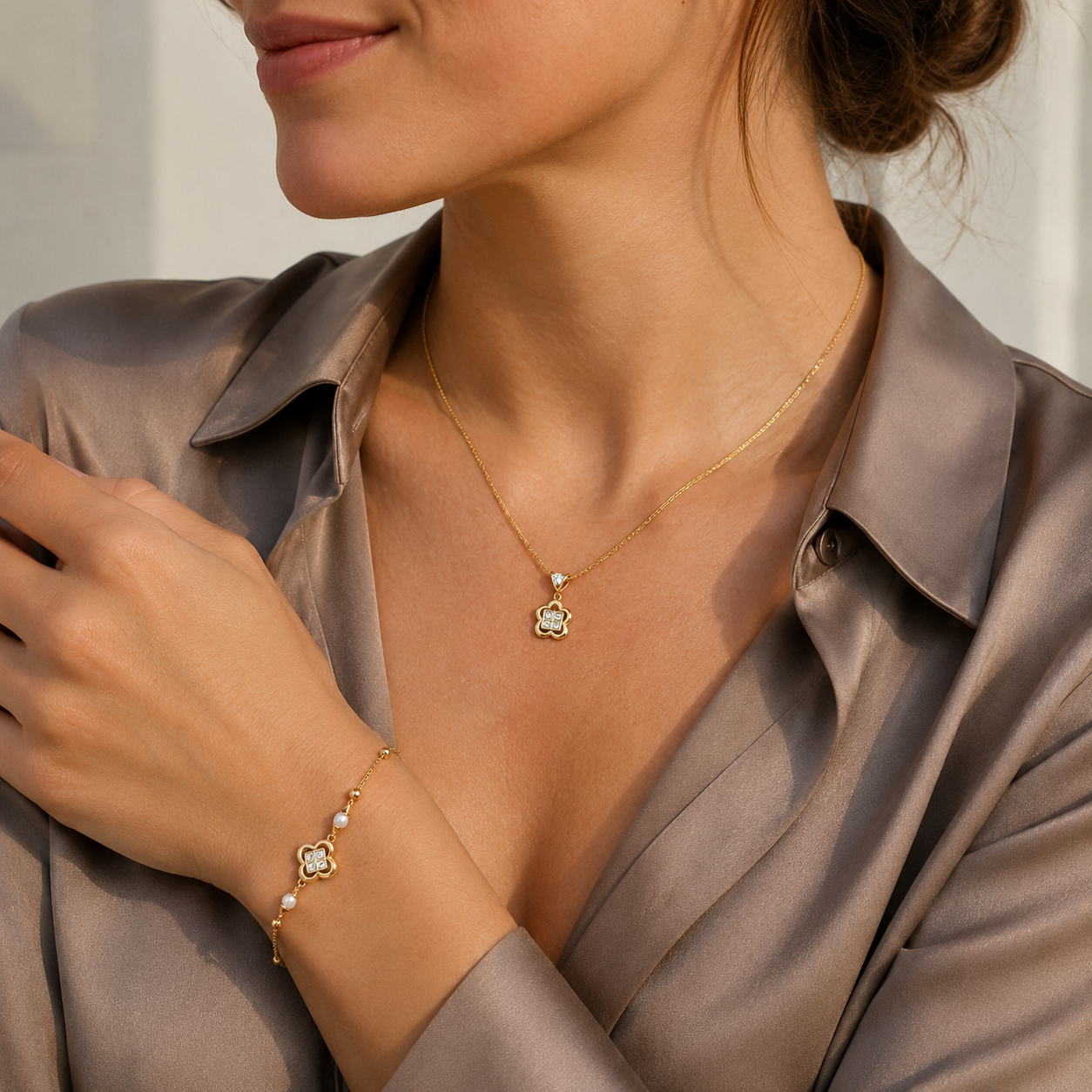 Close view of model wearing Vintage Gold clover necklace and bracelet jewelry set