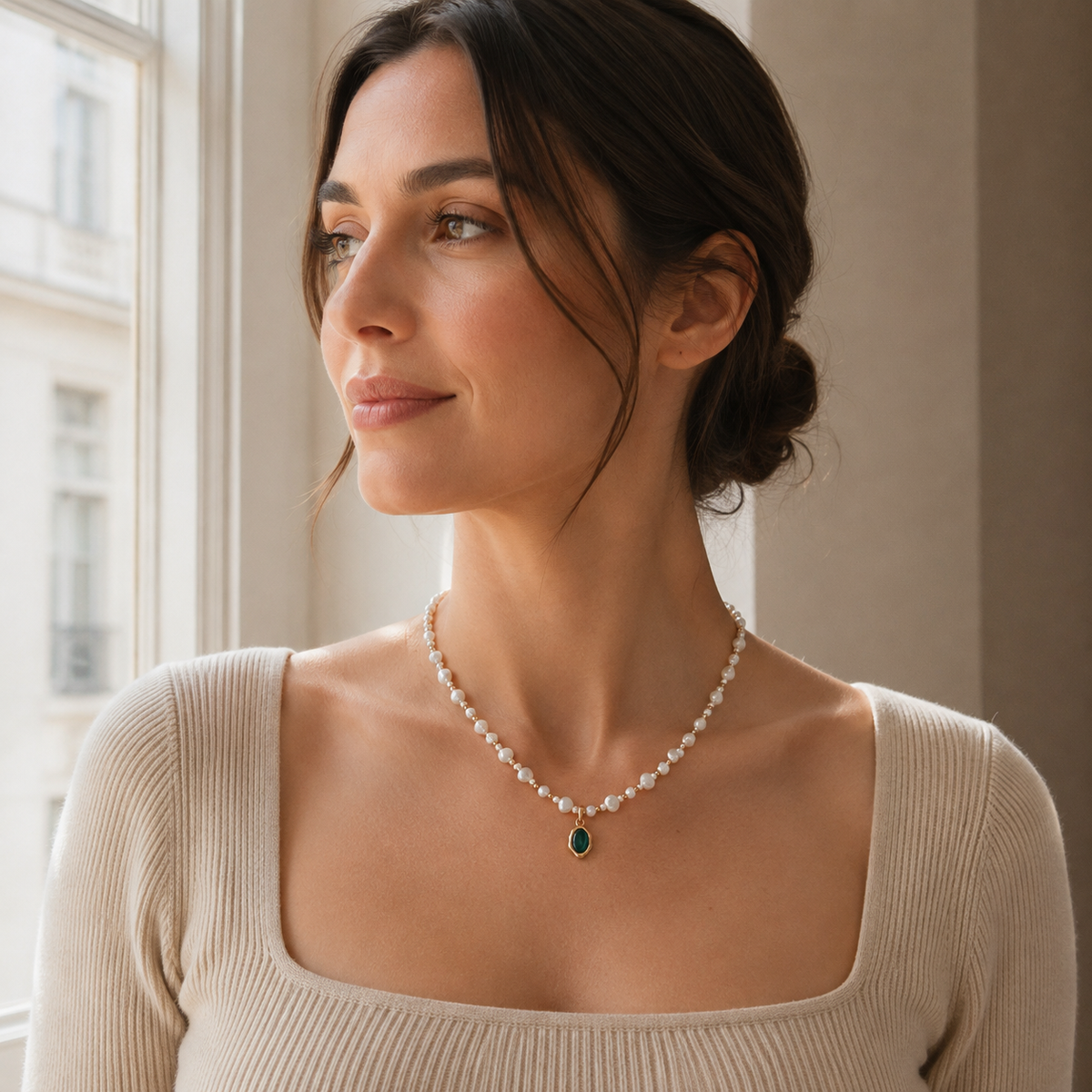 Model wearing the Vintage Gold natural pearl and malachite pendant necklace