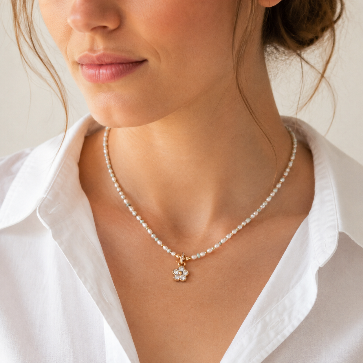 Close neckline view of the Vintage Gold Four Blessings Pearl Necklace
