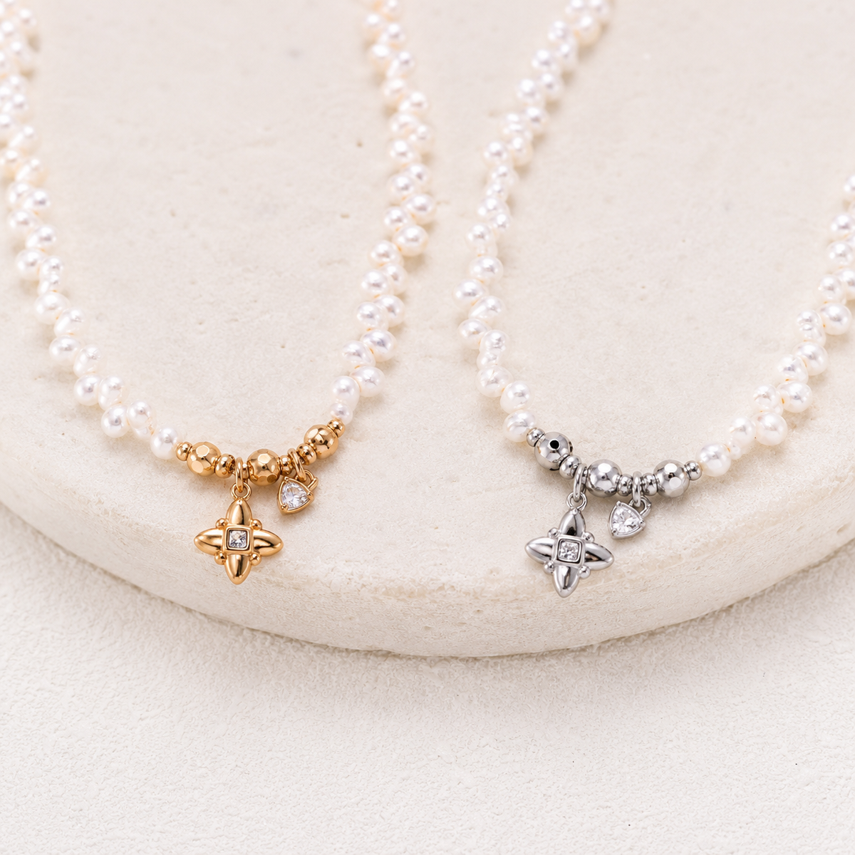 Close view of Vintage Gold and Silver celestial pearl charm necklaces