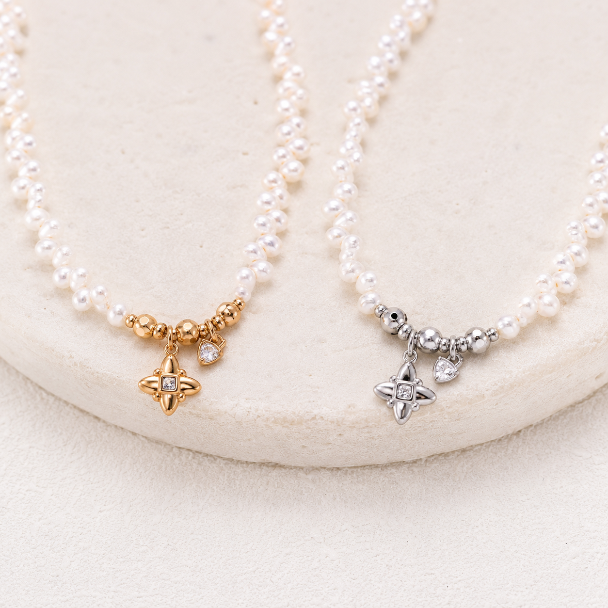 Close view of Vintage Gold and Silver celestial pearl charm necklaces