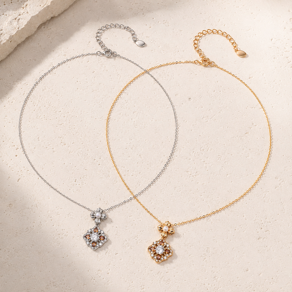 Vintage Gold and Silver auspicious bloom pearl pendant necklaces shown together