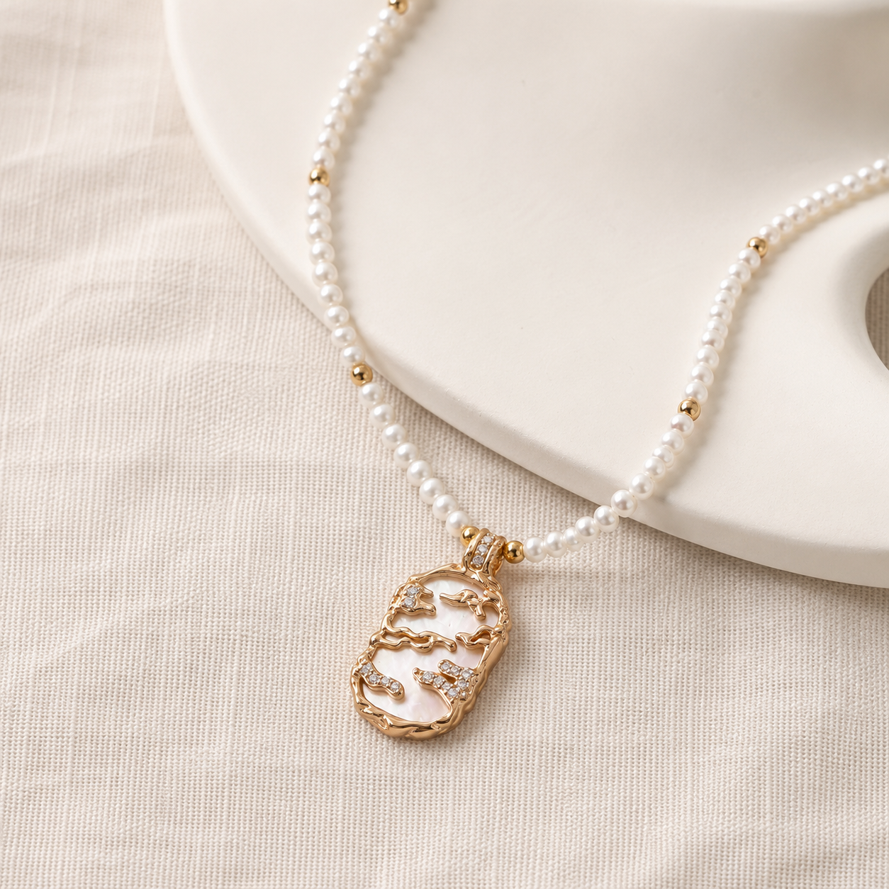Full view of the Vintage Gold mother-of-pearl pendant necklace with a natural pearl strand
