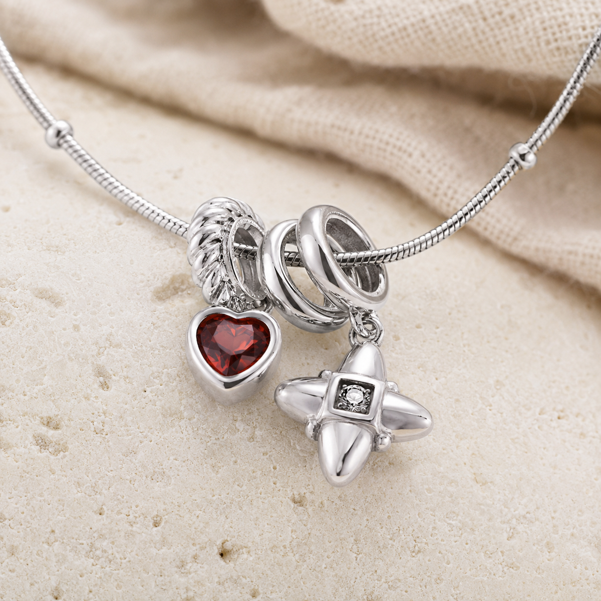 Close-up of Silver S925 zircon heart and star pendant necklace