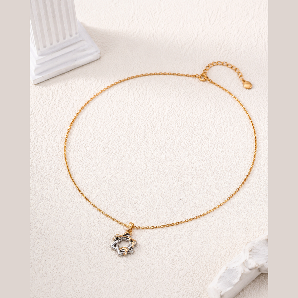 Full view of the adjustable Vintage Gold Interwoven Star Pendant Necklace