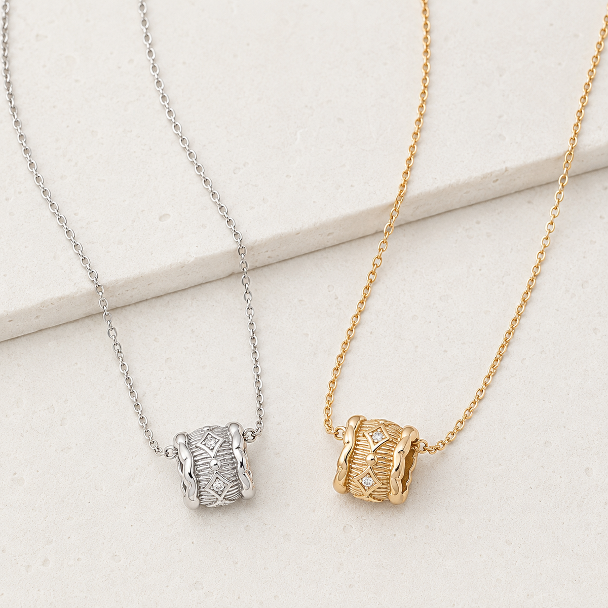 Vintage Gold and Silver Vintage Zircon Pendant Necklaces shown together