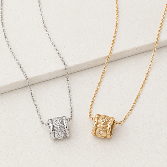 Vintage Gold and Silver Vintage Zircon Pendant Necklaces shown together