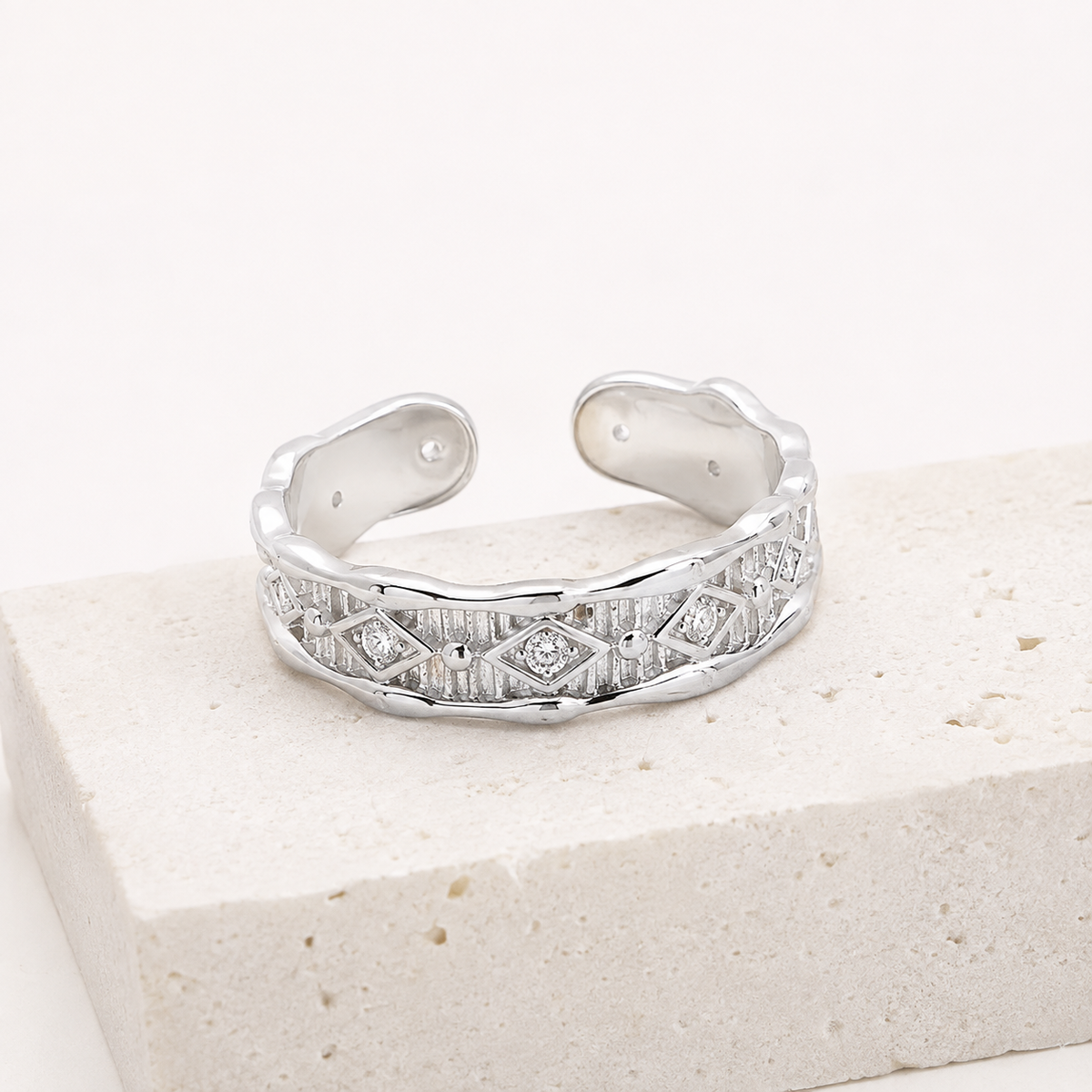 Silver Vintage Zircon Ring on a stone display