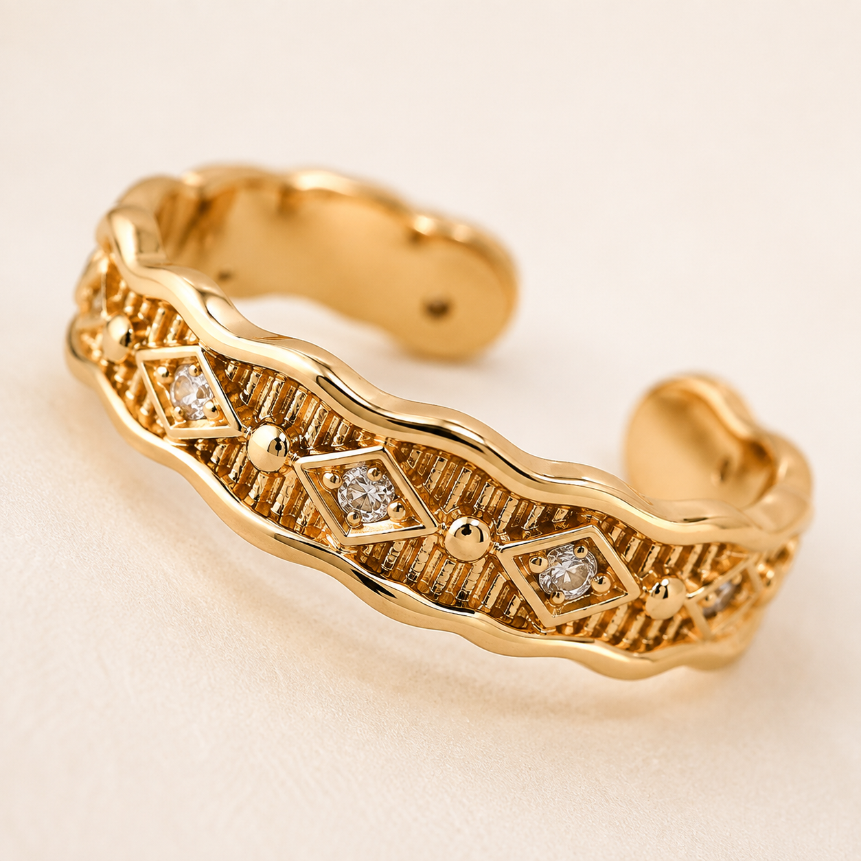 Close view of Vintage Gold Vintage Zircon Ring on ivory satin