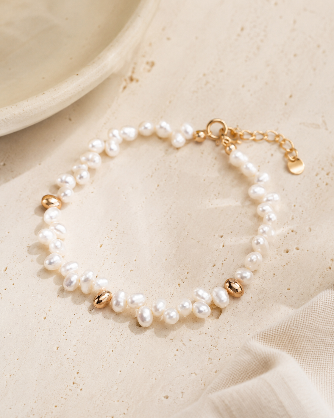 Natural pearl bracelet with polished Vintage Gold accents